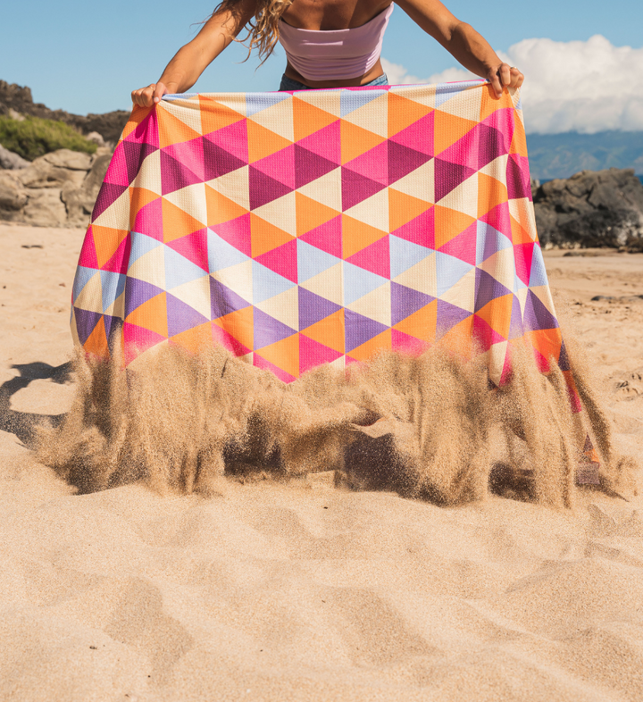 een strandhanddoek zandvrij door de speciale vezel van Buvanha